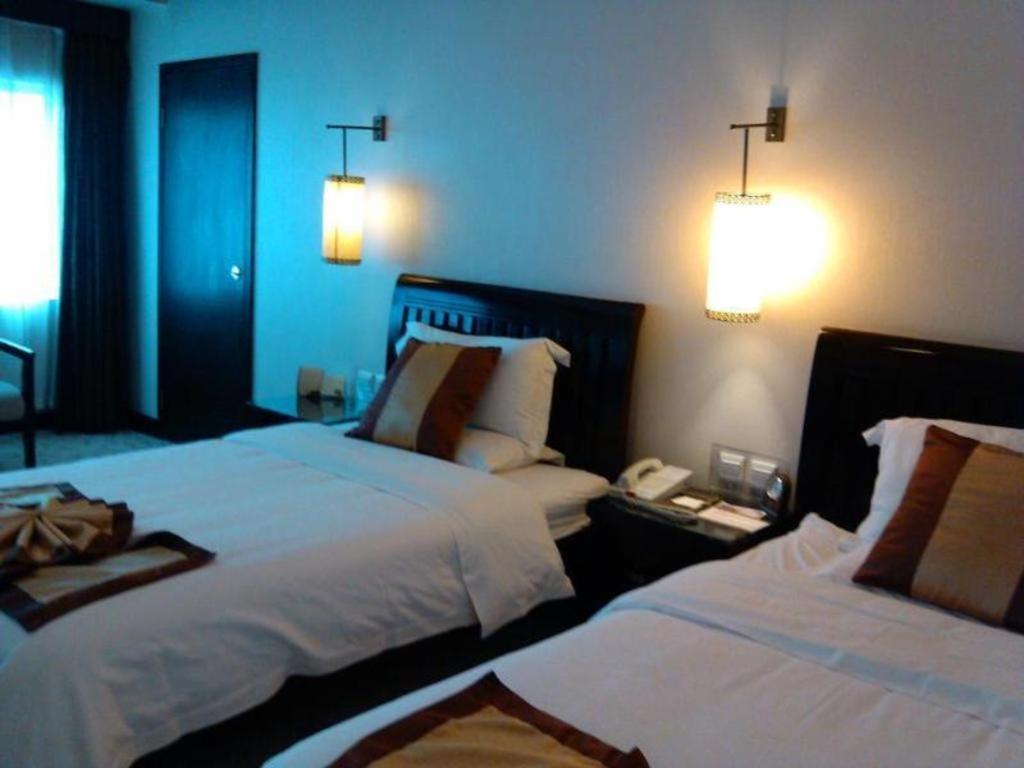 New Era Hotel Куньмин Экстерьер фото