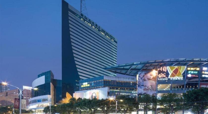 New Era Hotel Куньмин Экстерьер фото